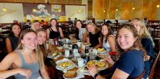 tudents enjoying lunch at Tasty Waffle Restaurant in Romeoville