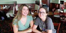 Friends enjoying lunch at Tasty Waffle Restaurant in Plainfield