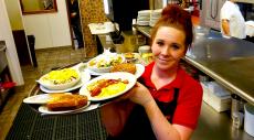 Friendly server at Tasty Waffle Restaurant in Romeoville