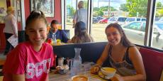 Friends enjoying lunch at Teddy's Diner in Elk Grove Village