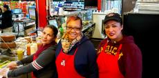 Staff preparing tacos at Teddy's Fruit & Meat Market in Hazel Crest