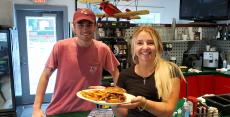 Customer and server at The Canteen Restaurant in Barrington