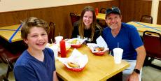 Family enjoying lunch at The Works in Glenview