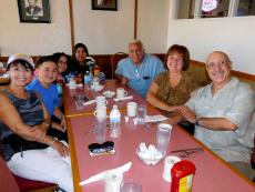 Friends enjoying lunch at Village Inn Restaurant in Huntley